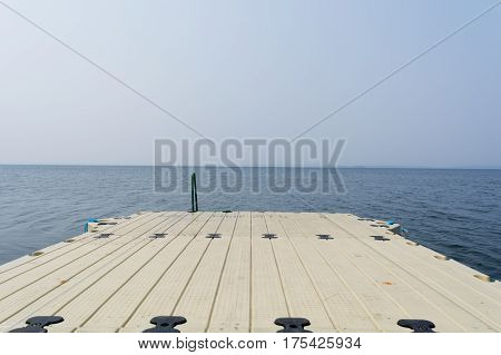 The plastic mooring on recreation facility the lake Uvildy. Summer Russia South Ural