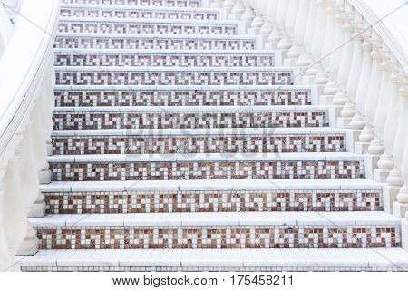 White Stairs With Mosaic Tile With Balusters. Abstract Classical Architecture Interior Fragment