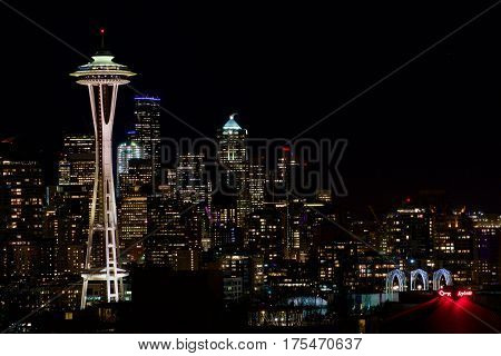 SEATTLE, WASHINGTON, USA - JAN 23rd, 2017: Night Cityscape of Seattle Skyline with Dark Sky Background for Building Lights, panorama seen from Kerry Park, Space Needle in focus.