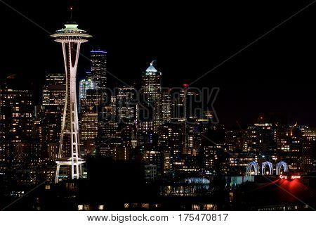 SEATTLE, WASHINGTON, USA - JAN 23rd, 2017: Night Cityscape of Seattle Skyline with Dark Sky Background for Building Lights, panorama seen from Kerry Park, Space Needle in focus.