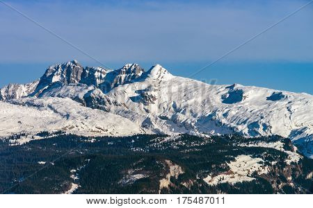 Beautiful Mountains In Snow. Evening Aerial View With Shadows.