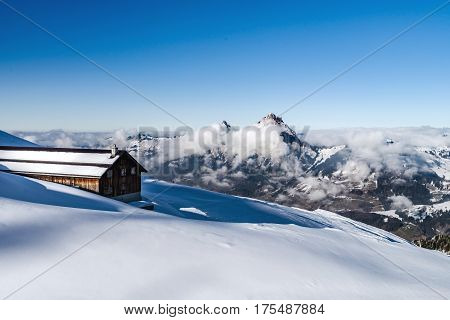 Beautiful Mountains In Snow. Evening Aerial View With Shadows.