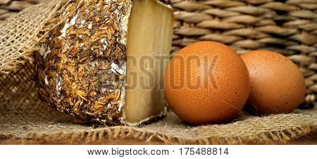 Sbarro Cheese With Grain Encrusted On Burlap With Eggs