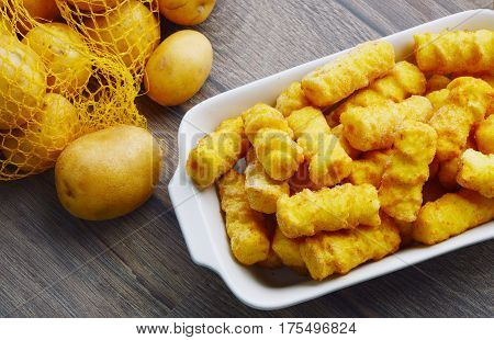 Frozen Cylindrical potato croquettes or German name is Kroketten