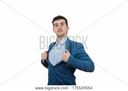 Young businessman acting with courage like a super hero and tearing his shirt off. Proud of yourself emotion isolated on white background.