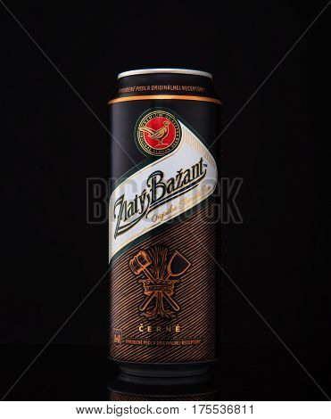 MINSK, BELARUS - JANUARY 04, 2017: Can of Zlaty Bazant beer over black background. Zlaty Bazant a Slovak beer brand produced in Hurbanovo brewery owned by Heineken Int group.