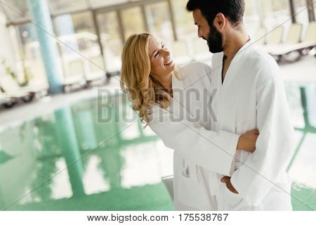 Happy Couple Relaxing At Wellness Spa Center