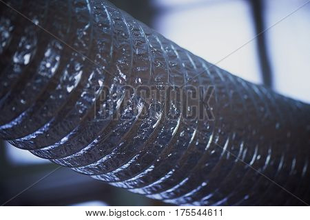 Abstract . Foil ventilation pipe. Industrial beauty of factory
