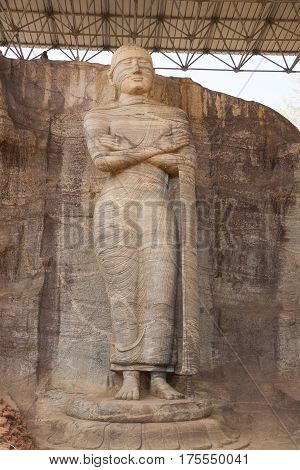 Statue of standing Buddha at Gal Vihara in Polonnaruwa or Pulattipura ancient city Kingdom of Polonnaruwa in Sri Lanka