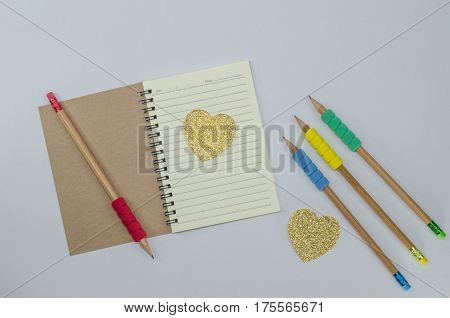 Writer recycled paper notebook open front cover on white background
