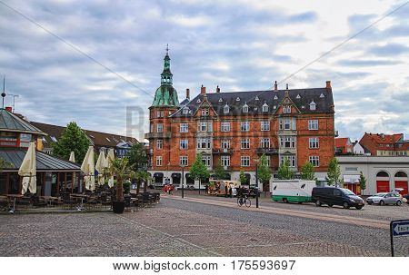 HILLEROD DENMARK 14 JUNE: Old scandinavian house restaurant and square of cobblestones near Frederiksborg castle in 2012