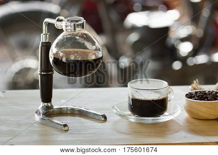 Close Up Of Siphon Vacuum Coffee Maker At Shop.