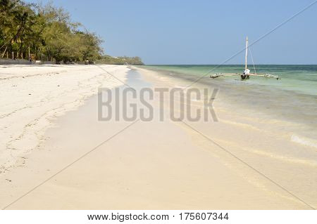 Bamburi sandy beach with a ditch near Mombasa in Kenya