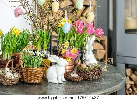 Easter decoration with flowers and eggs. Festive home interior. Selective focus