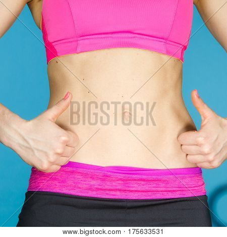 Woman Showing Some Strong Abs And Flat Belly