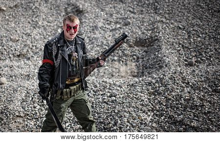 Killer with chains and machetes and grenade launchers