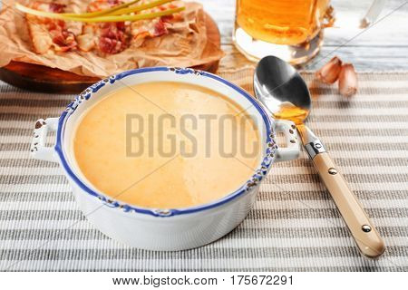 Delicious cream soup on table