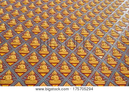 Pattern of golden buddha sculpture at Chayamangkalaram templeMalaysia