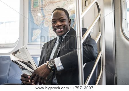 Businessman in full suit in New York subway metro