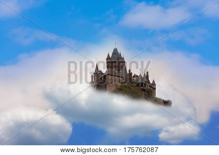 Photomontage of Reichsburg Cochem. Castle in the air Fantasy castle in the clouds