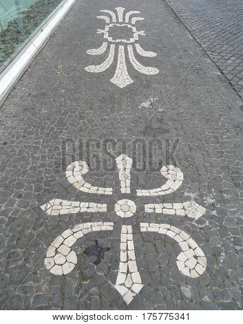 Typical Portuguese black and white stone mosaic 