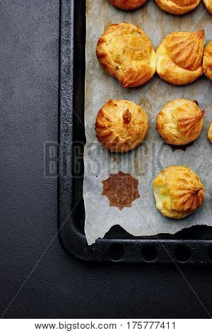 Baked Profiteroles On Tray Ready For Croquembouche. Top View. Copy Space