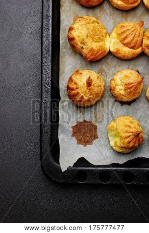 Baked Profiteroles On Tray Ready For Croquembouche. Top View. Copy Space