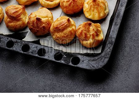 Baked Profiteroles On Tray Ready For Croquembouche. Top View. Copy Space.selective Focus