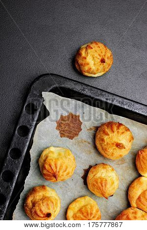 Baked Profiteroles On Tray Ready For Croquembouche. Top View. Copy Space.selective Focus