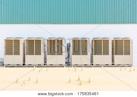 Air conditioning system assembled on side of a building - cooling and heating residential system