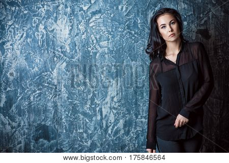 Portrait of a beautiful young woman with brunette hair. Beauty, fashion concept. Cosmetics.
