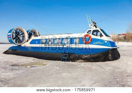 SAMARA RUSSIA - MARCH 11 2017: Hovercraft on the ice of the frozen Volga river in Samara Russia