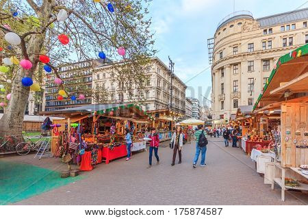 BUDAPEST HUNGARY - APRIL 13 2016: Tourists and visitors on Vaci Utca street the main pedestrian thoroughfares and perhaps the most famous street of central Budapest on April 13 2016. Budapest