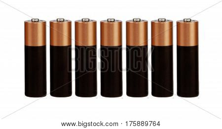 Seven batteries of the type AAA on a white background, isolated