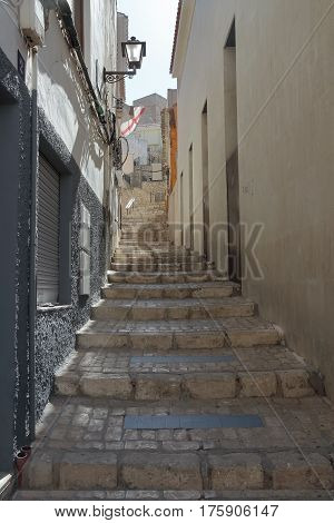 nice steep street with stairs in the town of Petrer in the province of alicante spain