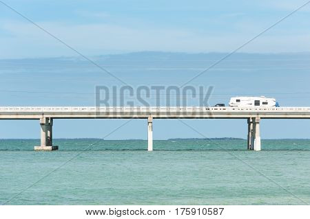 RV traveling on Seven Mile bridge of Overseas Highway between Florida Keys, USA