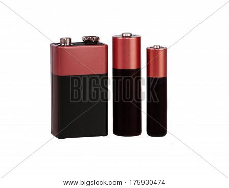 Different batteries, type AAA, type AA, type PP3, white background, isolated