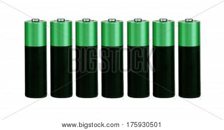 Seven batteries of the type AA on a white background, isolated