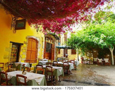 traditional terrace with flowering bushes architecture detail in Greece