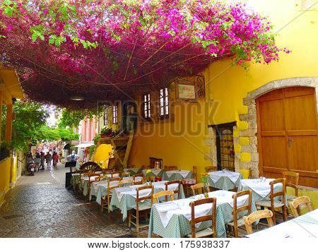 traditional terrace with flowering bushes architecture detail in Greece