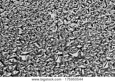 Water drops on surface condensation silver gray