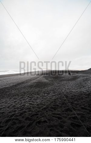 Beautiful volcanic black sand beach in Dyrholaey near Vik, Iceland.