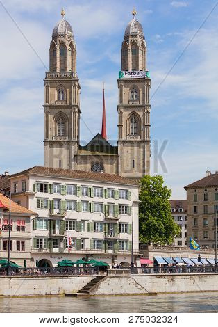 Zurich, Switzerland - May 25, 2016: Towers Of The Grossmunster Cathedral In The City Of Zurich, Peop