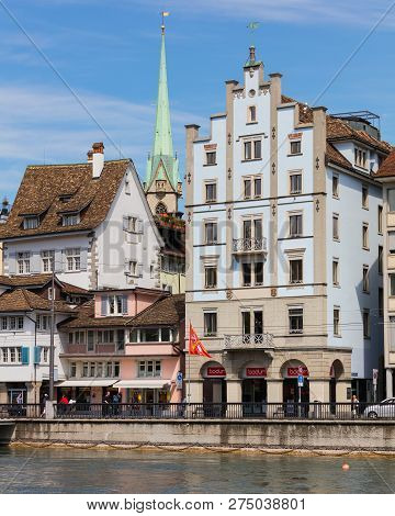 Zurich, Switzerland - May 25, 2016: Buildings Of The Historic Part Of The City Of Zurich, Tower Of T
