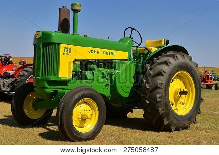 Pekin, North Dakota, September 2, 2018: An Old Restored 730 Diesel John Deere Tractor  Is On Display
