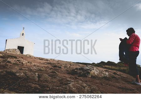 Tourists Visiting The Surroundings Of La Meule Chapel Near Island Of Yeu