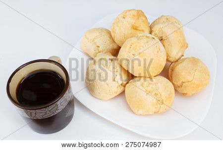 Brazilian Breakfast, Cheese Bread (pao De Queijo) Served On Dish On White Table With Coffee.