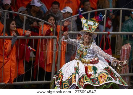 Oruro, Bolivia - February 25, 2017: Members Of A Waca Waca Dance Group In Ornate Costume Parade Thro