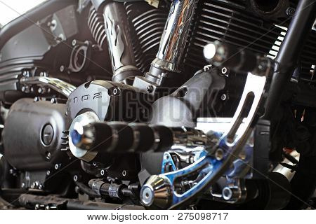 Cropped Close Up Shot Of Beautiful And Custom Made Motorcycle In The Workshop