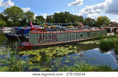St Neots, Cambridgeshire, England - August 25, 2018: Narrow  Boats On The River Ouse At St Neots.